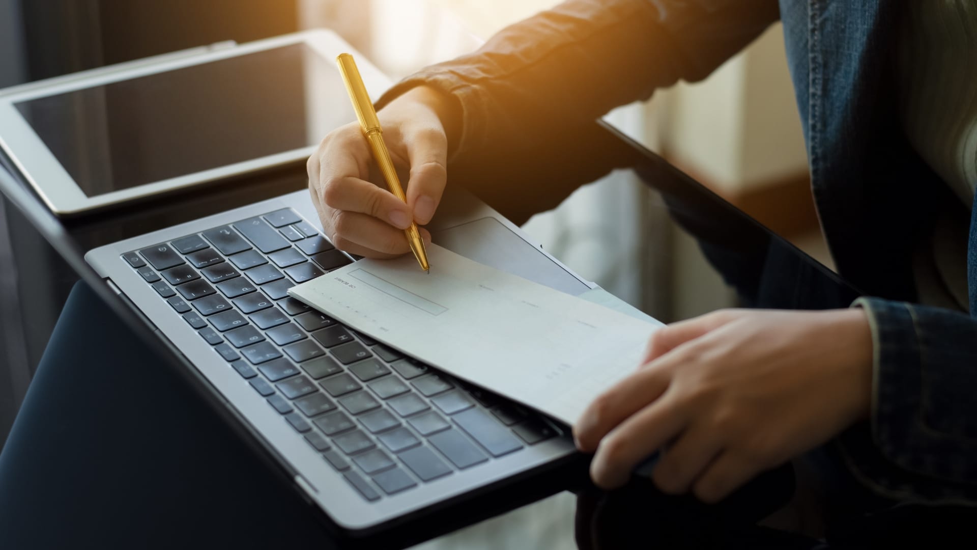 Payroll professional using software for payroll management