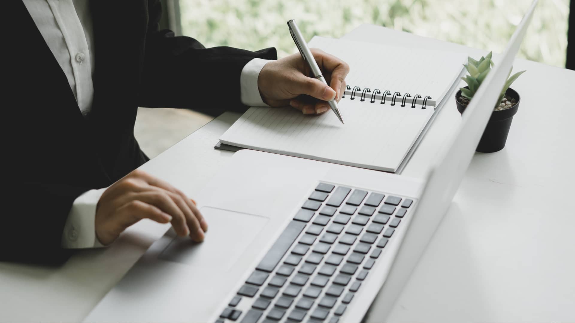 Accountant using advanced tax software to identify deductions and credits