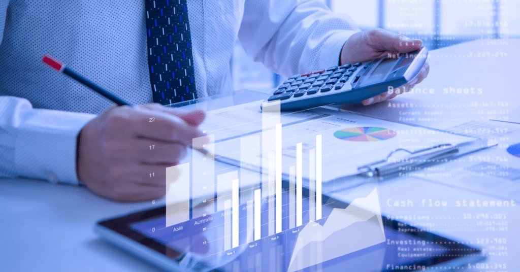 Small business owner reviewing cash flow management strategies on a laptop